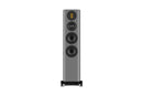 Gray floor-standing speaker on a white background
