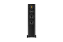 Black floor-standing speaker on a white background