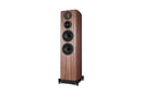 Wooden floor-standing speaker on a white background