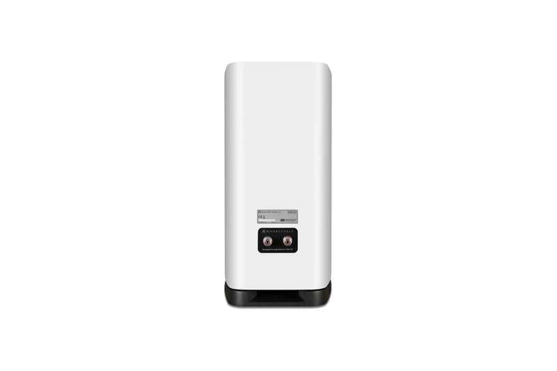 Back of a white bookshelf speaker with a black base on a white background