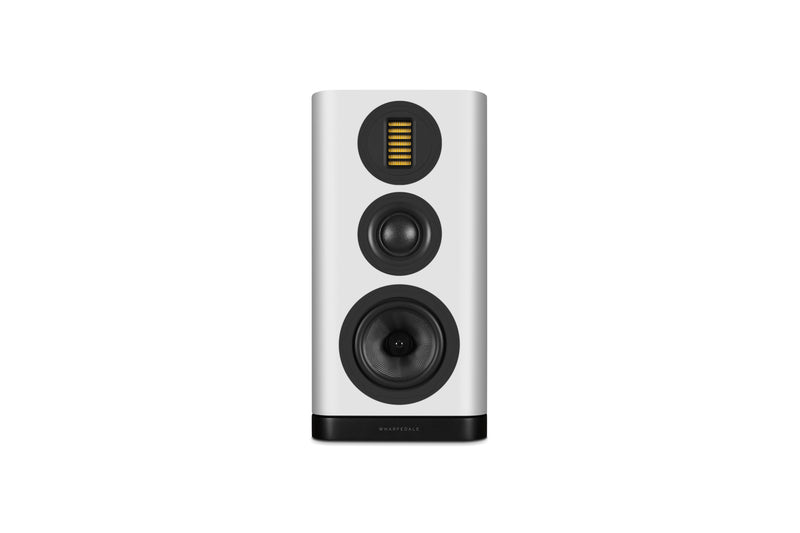White bookshelf speaker with black accents on a white background