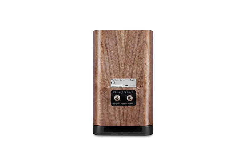 Back of a wooden bookshelf speaker on a white background