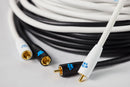 Coiled black and white audio cables with gold RCA connectors on a light grey background