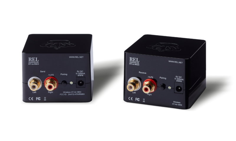 Two black audio components with gold and red connectors