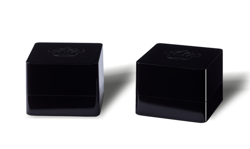 Two black square boxes with a REL logo on top