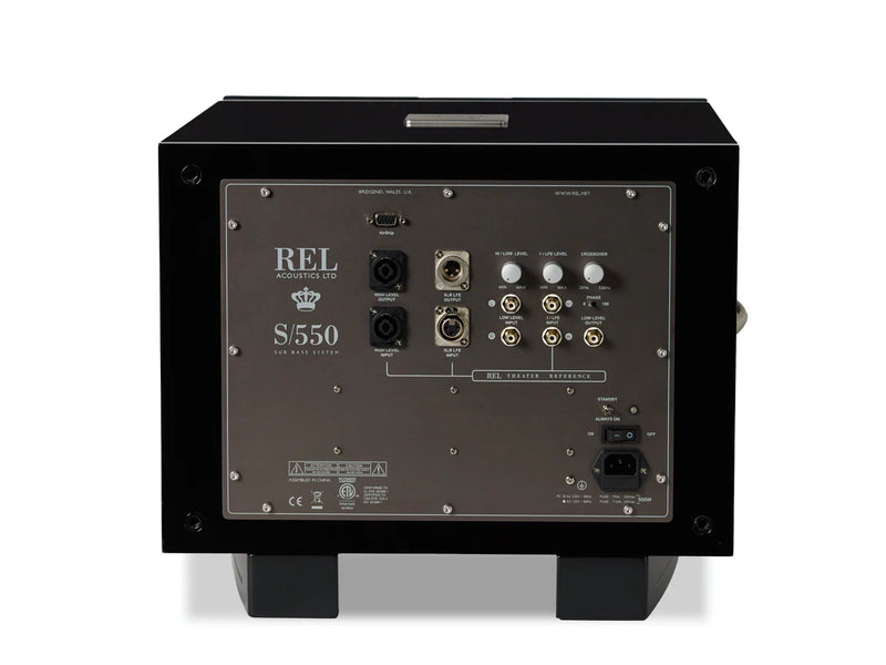 Back of a black subwoofer with REL branding