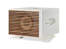 White subwoofer with REL branding and a wooden slatted cover on a white background